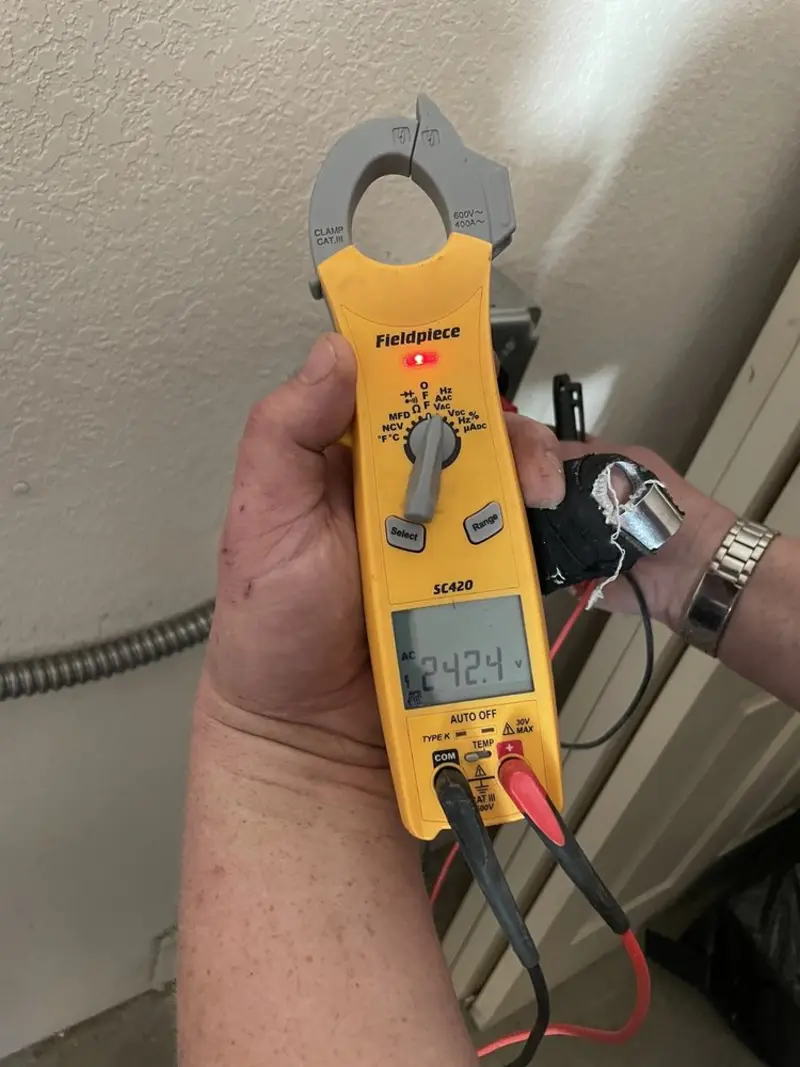 Voltage testing with clamp meter during Circuit Breaker Repair in Westbrook